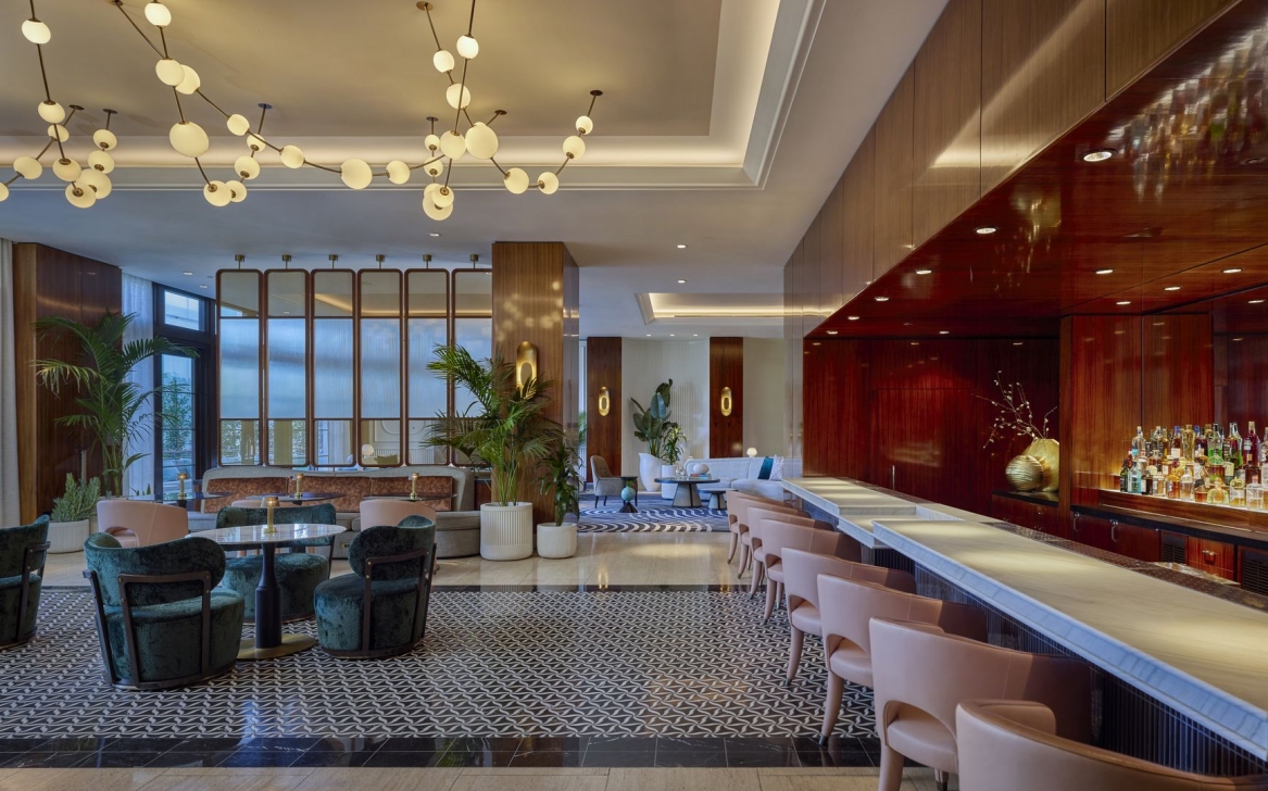 Luxurious bar interior featuring unique lighting and elegant seating.