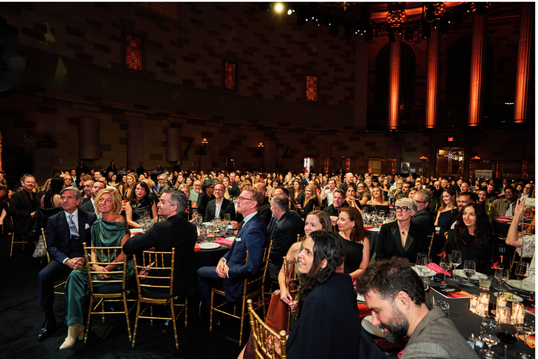 Attendees celebrate outstanding hospitality projects at AHEAD Americas in an elegant setting.