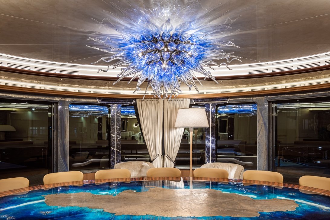 Blue crystal luminaire in the shape of the sun