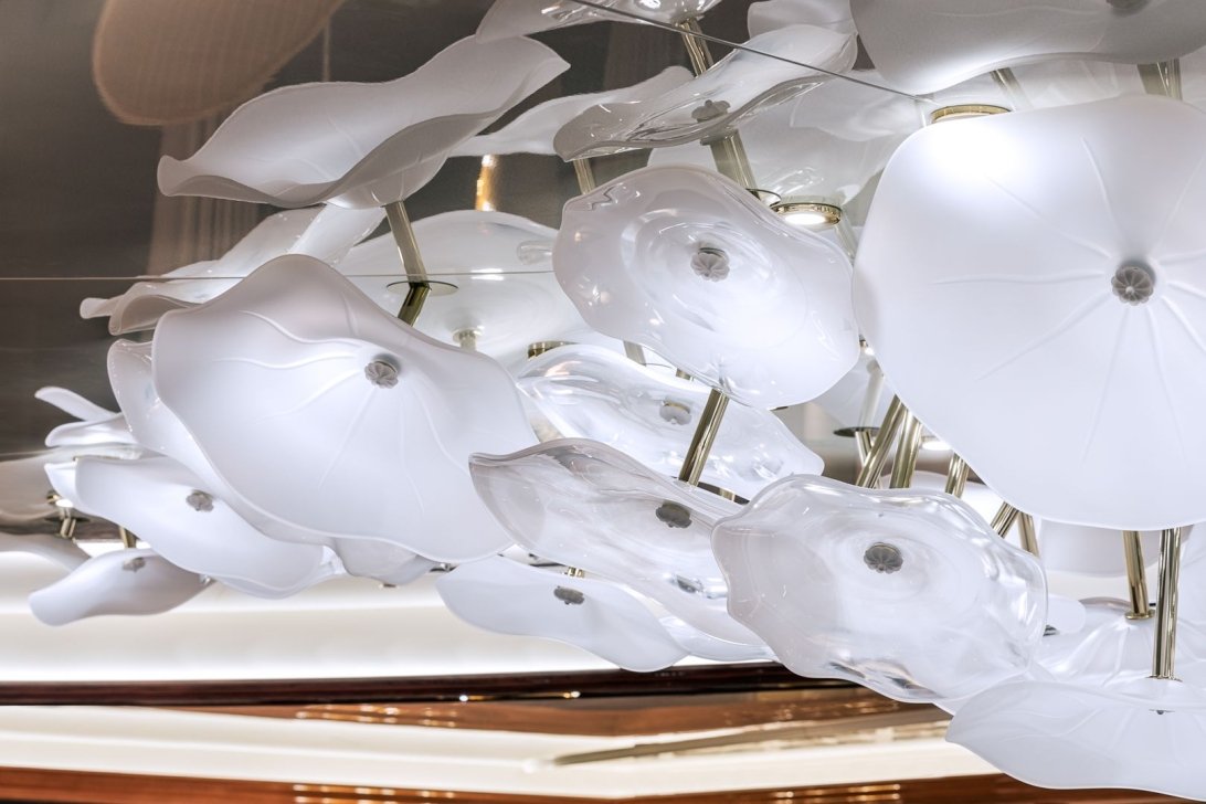 Lighting with 64 hand-blown glass plates