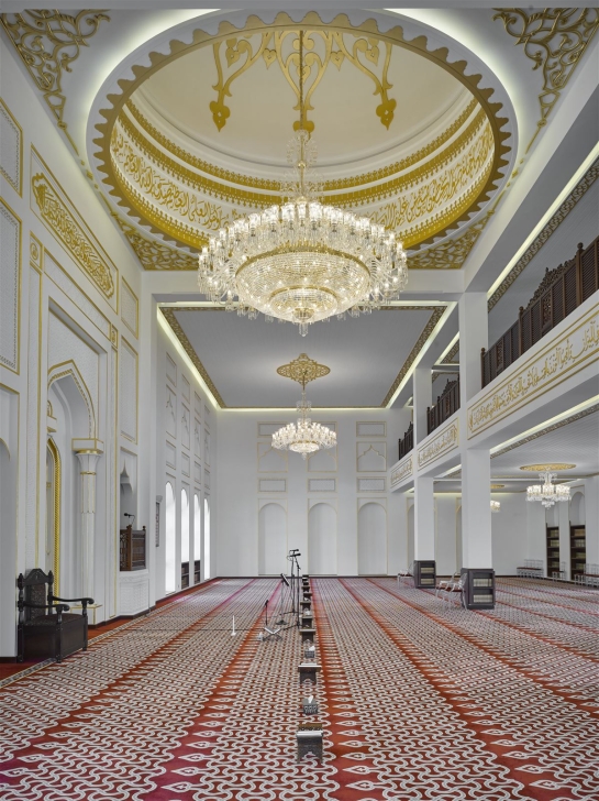 Hallway with chandeliers