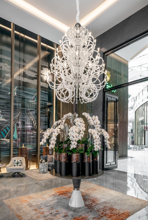 Venus lighting with orchids and sofas