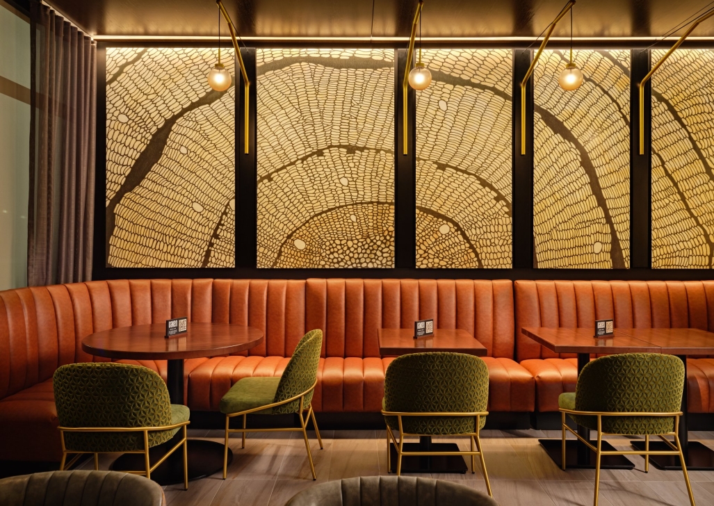 Hand-blown glass wall sconces in the Oaken Bistro