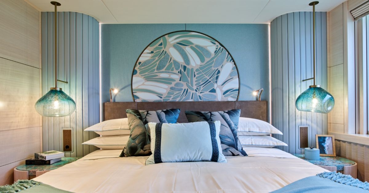 Luxurious bedroom on the Sparta yacht featuring modern design and a cozy atmosphere.