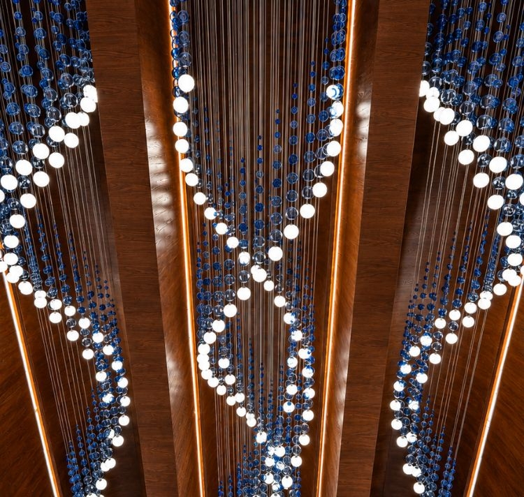 Elegant interior of Al Irfan Mosque featuring modern design and decorative elements.