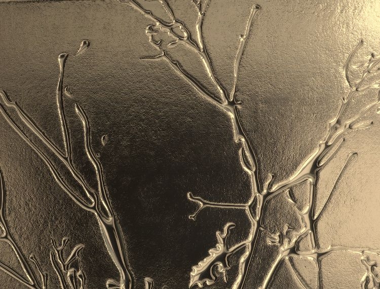 Golden branches on a shiny background creating an abstract artistic impression.
