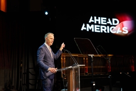 Conference leader at AHEAD Americas presenting hospitality awards.
