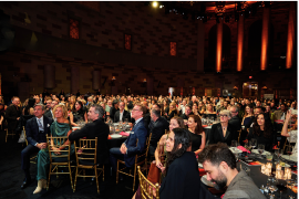 Attendees celebrate outstanding hospitality projects at AHEAD Americas in an elegant setting.