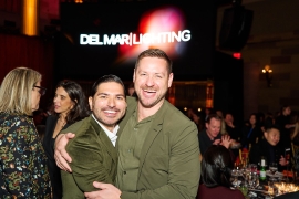 Joyful gathering of attendees at the AHEAD Americas event celebrating hospitality.